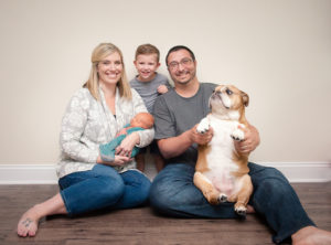 family with bulldog
