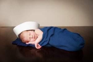 newborn with sailor hat