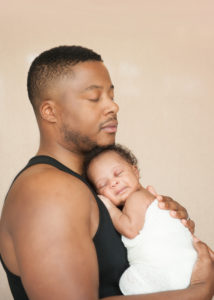 baby girl with father