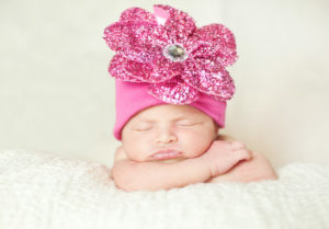 newborn with hat
