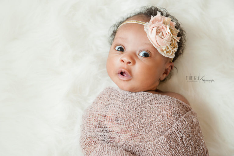 newborn with bright eyes