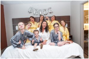 silly bridesmaids on bed