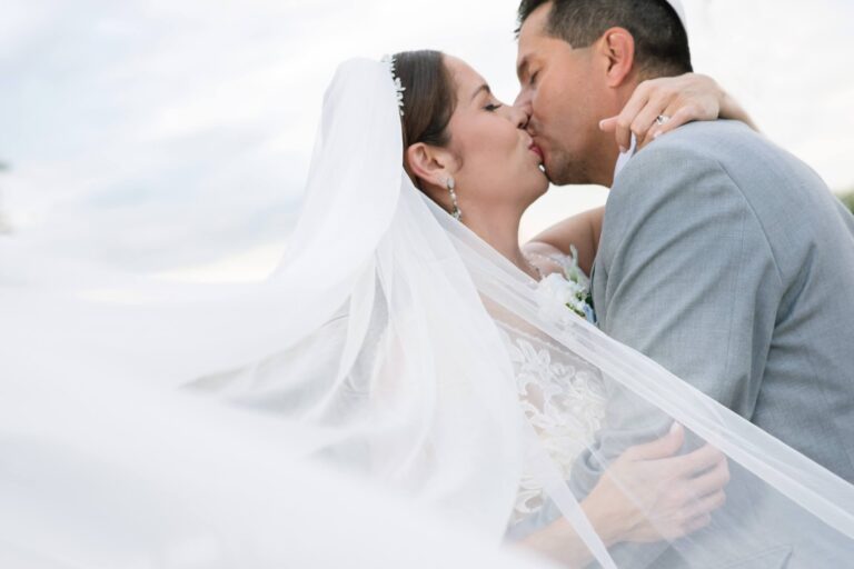 bride and groom kissing