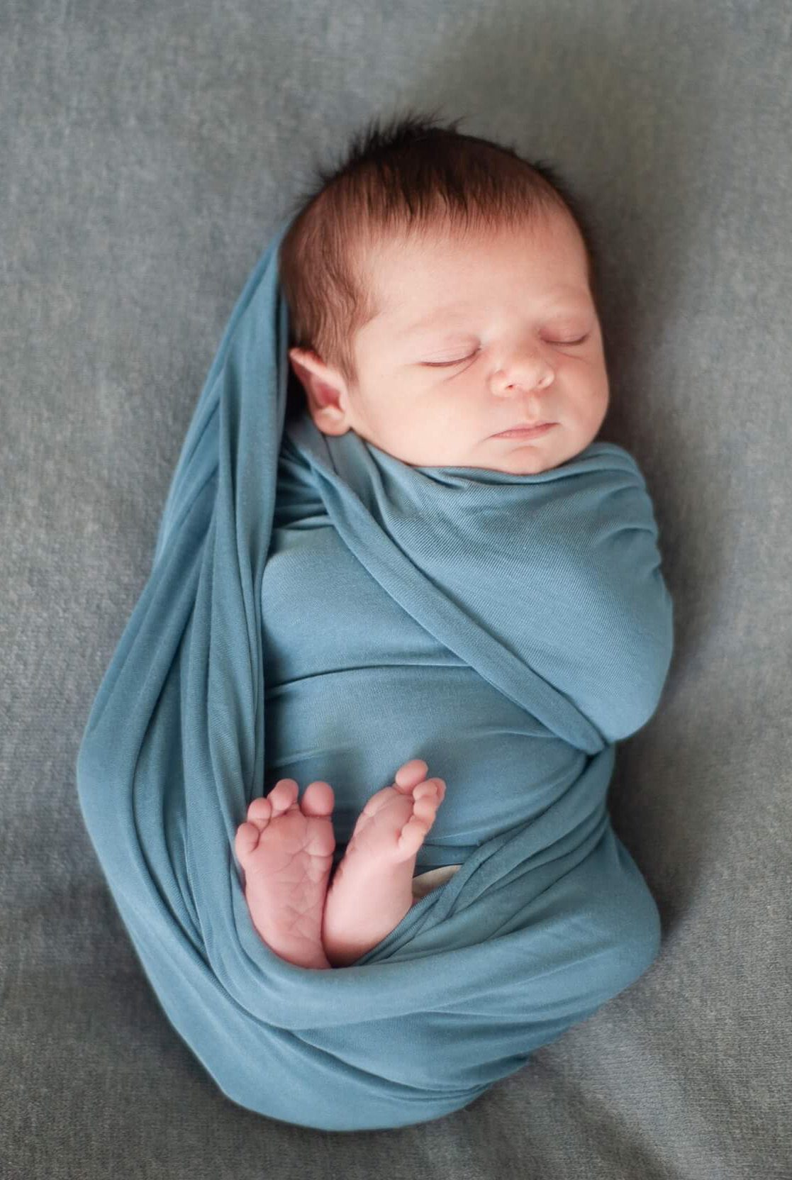 Maryland newborn photographer, baby in blue blanket, by Nina K Photography